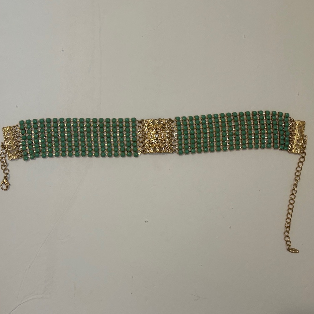 Gold and green beaded choker with gems